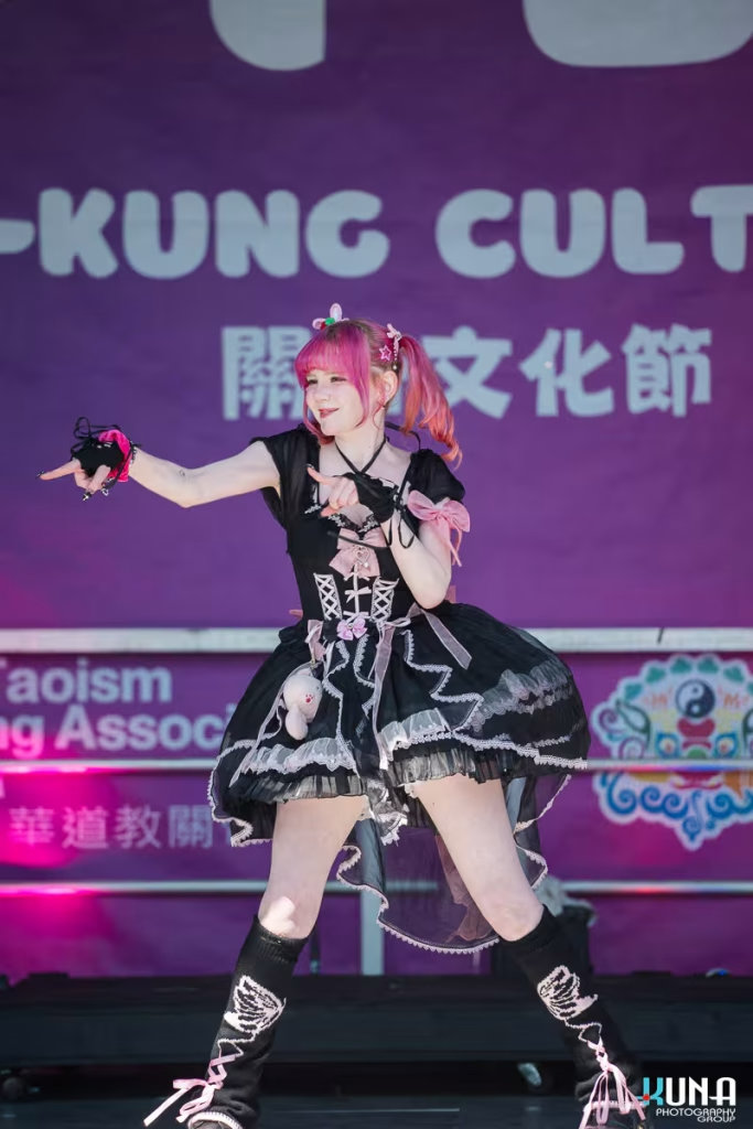TJ Fest 2025 Kuna Photography: Vancouver Event Photographer. Performer in a pink-haired Gothic Lolita outfit dancing on stage at TJ Fest in Burnaby, BC.
