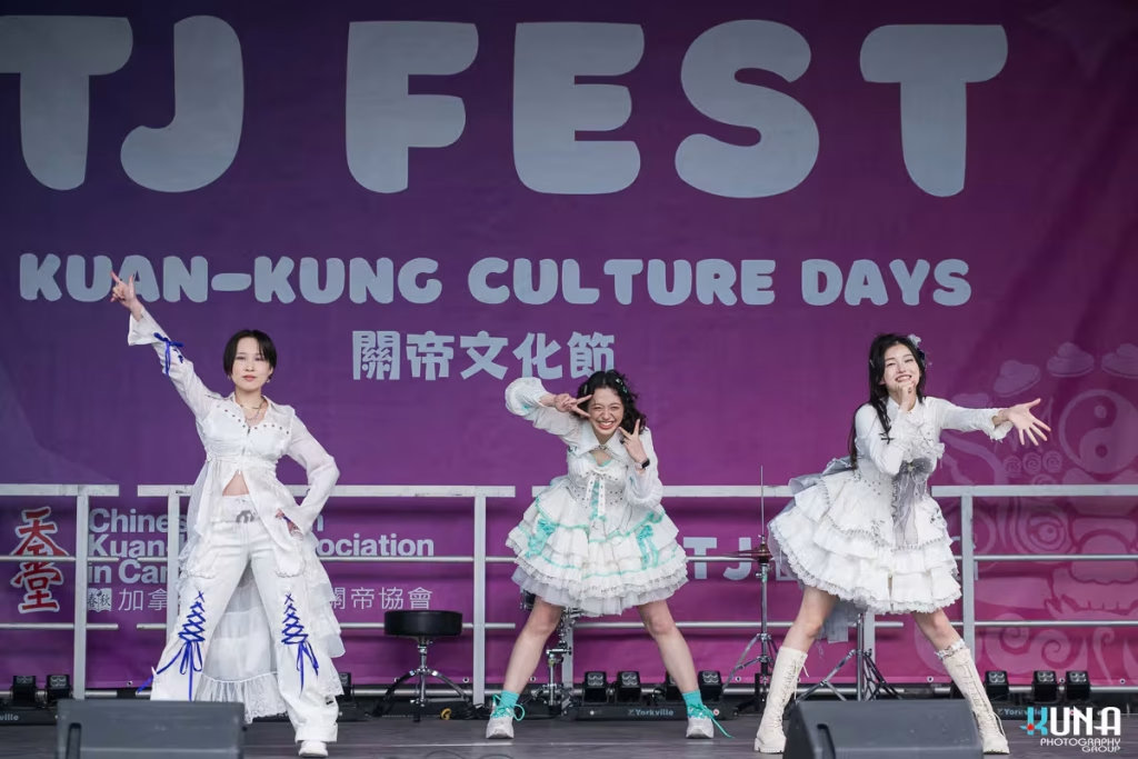 TJ Fest 2025 Kuna Photography: Vancouver Event Photographer. J-pop group Cloud Town Idols in white ruffles performing at a multicultural street festival in BC.
