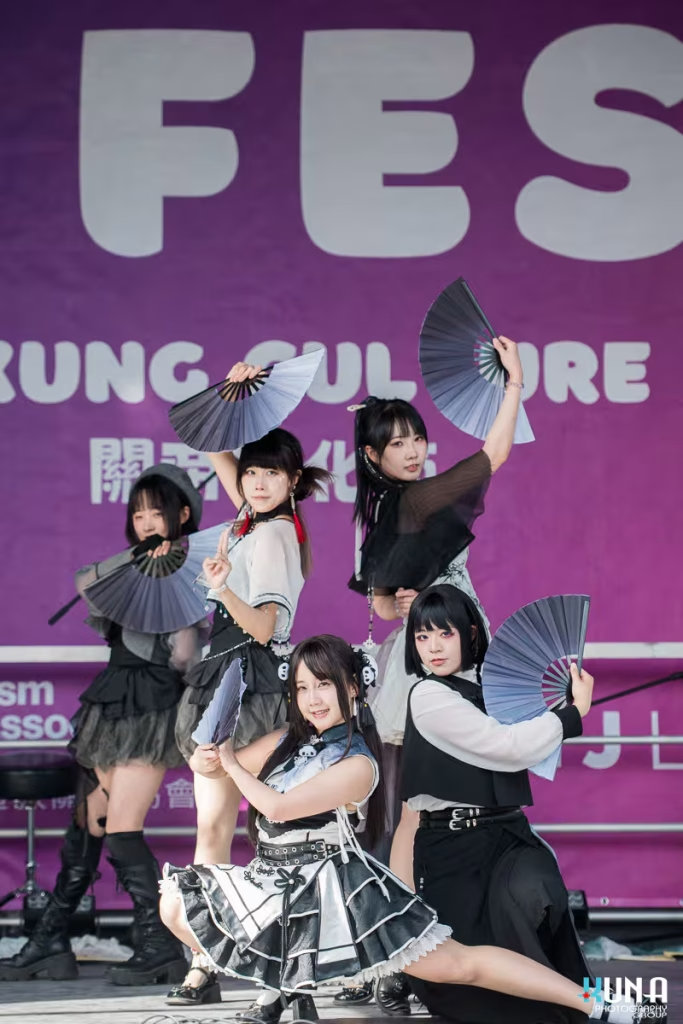 TJ Fest 2025 Kuna Photography: Vancouver Event Photographer. Musa Idol in stylized outfits performing with traditional fans on the main stage at TJ Fest, BC.