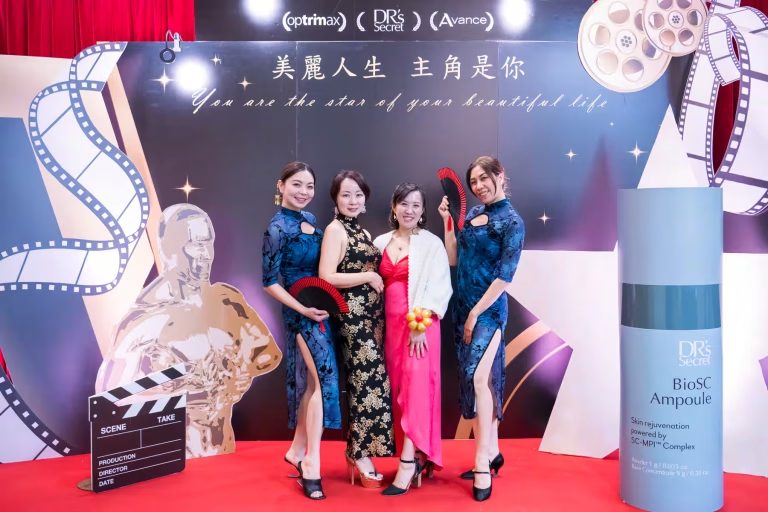 Vancouver event photography captures Four elegant attendees posing in traditional cheongsams and gowns on the red carpet at the Dr's Secret beauty event at The Westin Wall Centre, showcasing premier Vancouver event photography in Richmond, Metro Vancouver, British Columbia, Canada.