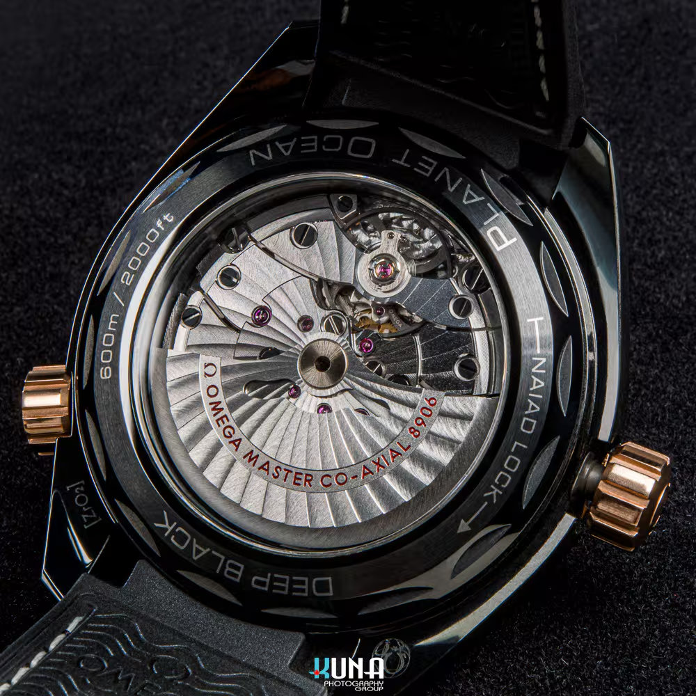 Kuna Photography - Omega Calibre 8906 Exhibition Case Back Kuna Photography commercial product photographer exhibition case back shot of Omega Calibre 8906 movement and Naiad Lock system.
