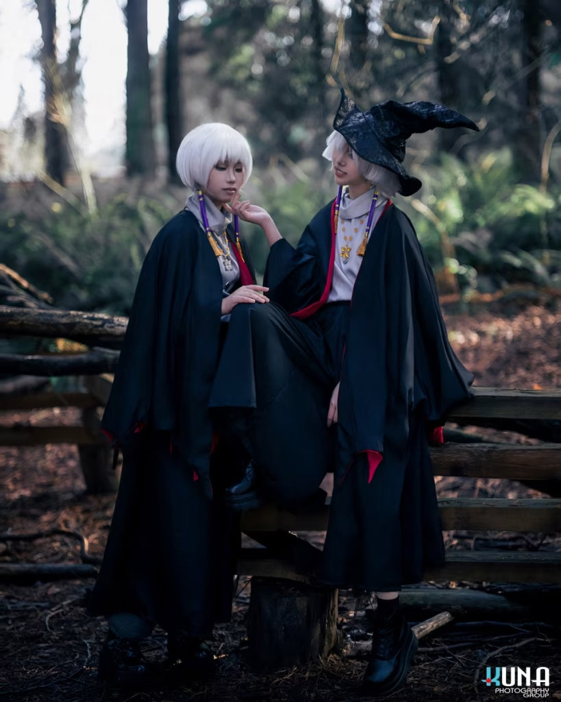 Two white-haired Sky: Children of the Light cosplayers interacting on a forest fence, captured by a Vancouver cosplay photographer.