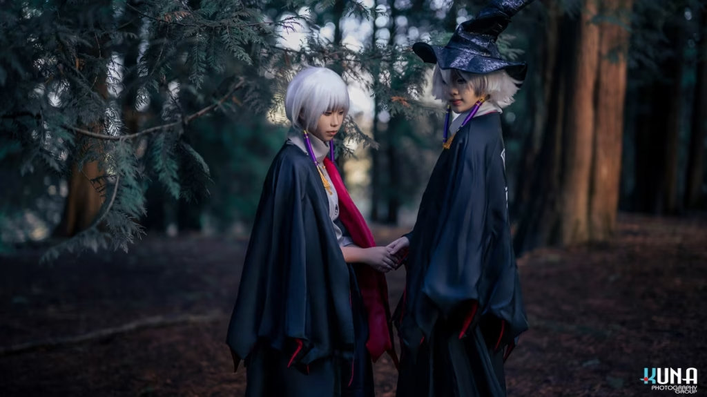 Full body shot of a Sky: Children of the Light cosplay duo holding hands on a forest path, captured by a Vancouver cosplay photographer.