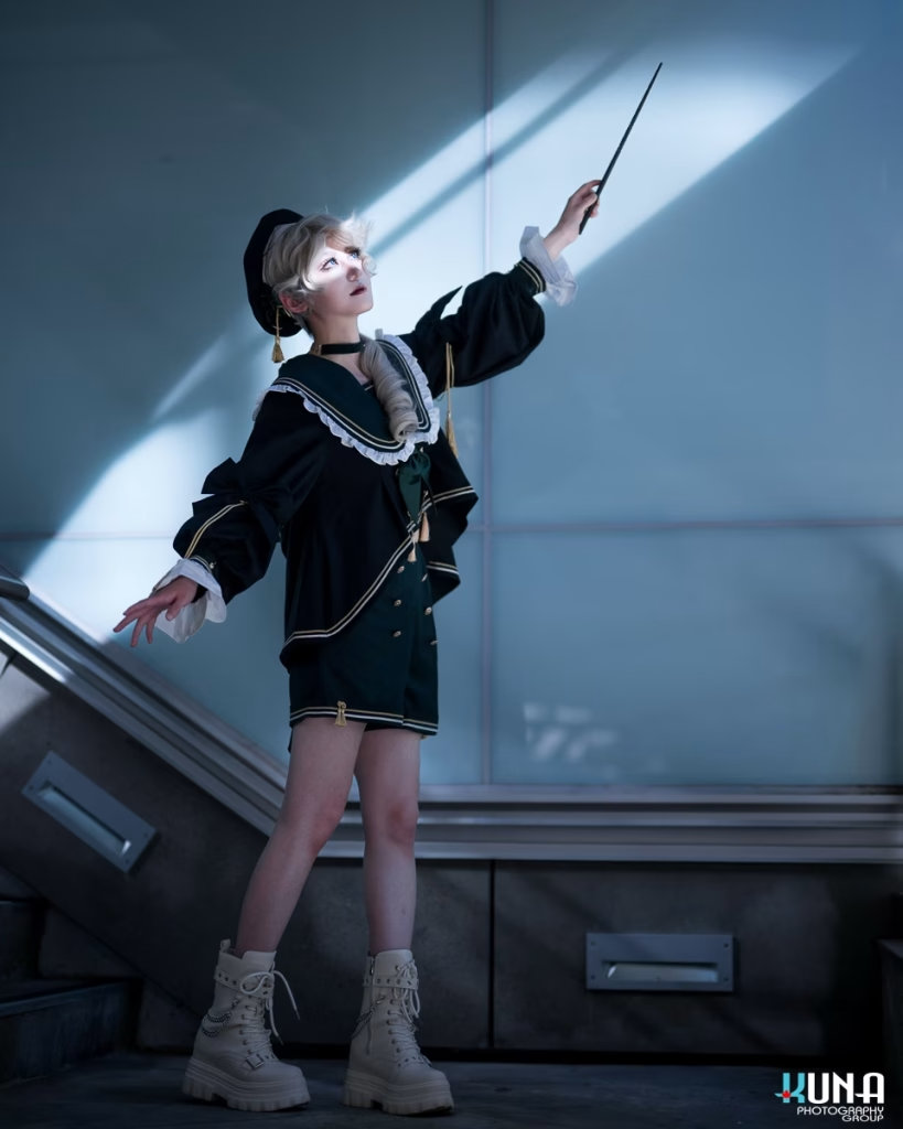 Full body shot of a wizard cosplayer casting a spell with a wand, Kuna Photography.