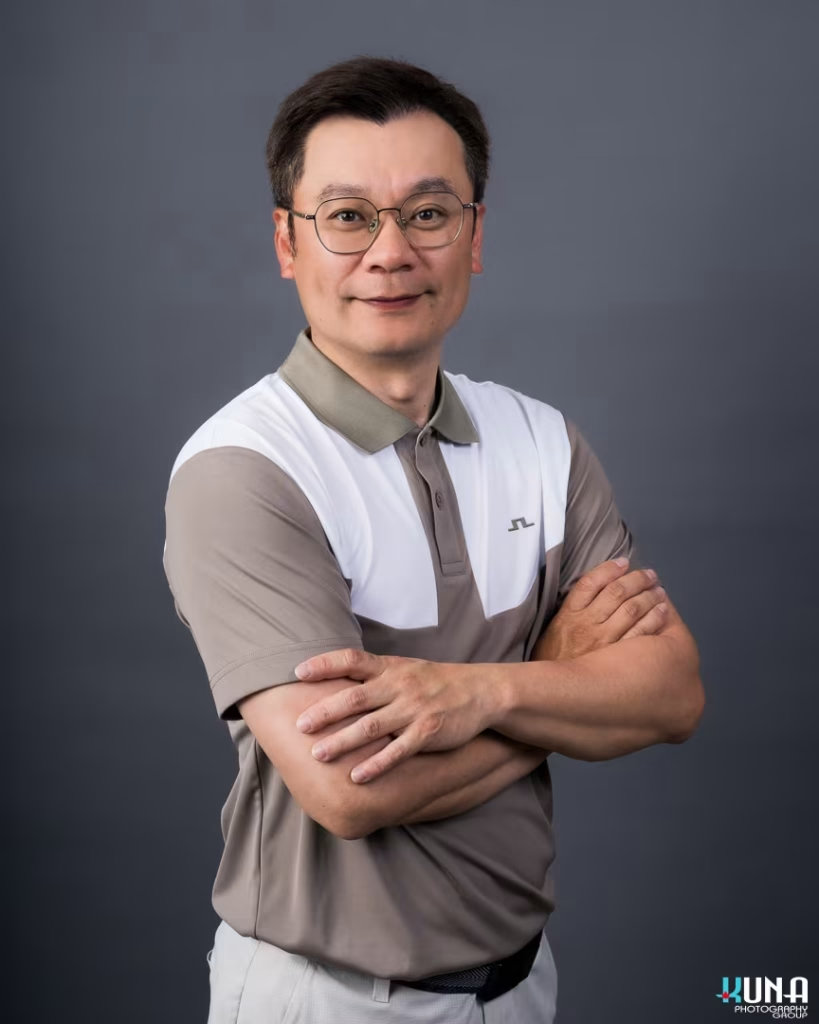 Modern professional board member headshot of a male TCCBC director with glasses in Vancouver British Columbia