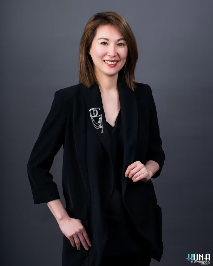 Stylized corporate board member headshot of a female TCCBC director with a luxury brooch in Vancouver British Columbia