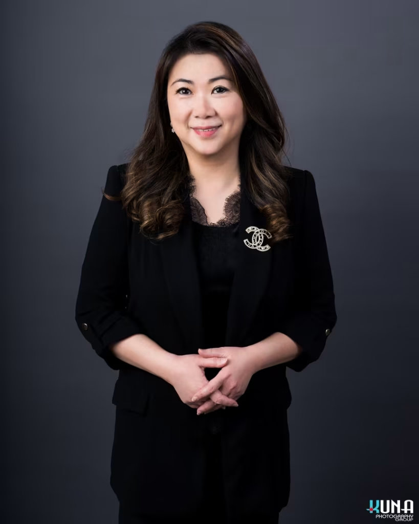 Gorgeous corporate board member headshot of a female TCCBC director with long wavy hair in Vancouver British Columbia