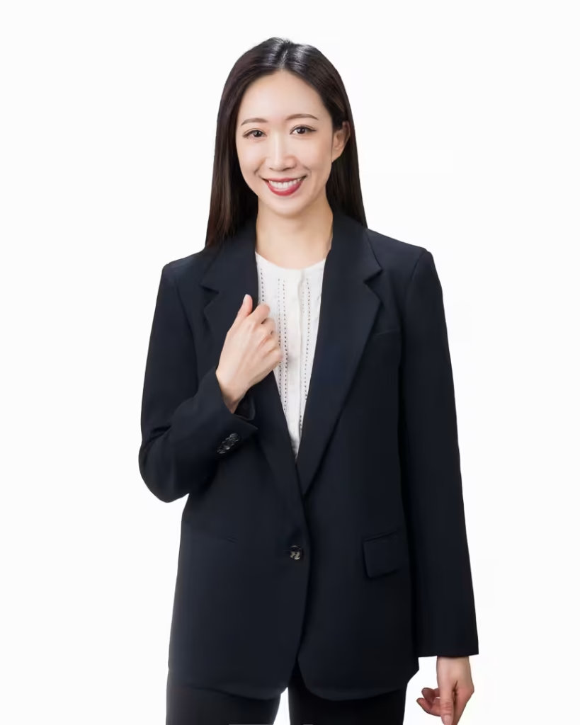 Karen, real estate representative at VanHaus, posing gracefully in a black blazer for her vancouver corporate headshot.