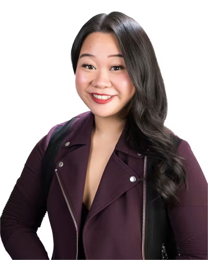 A professional real estate leasing specialist at VanHaus posing for a modern vancouver studio headshot.
