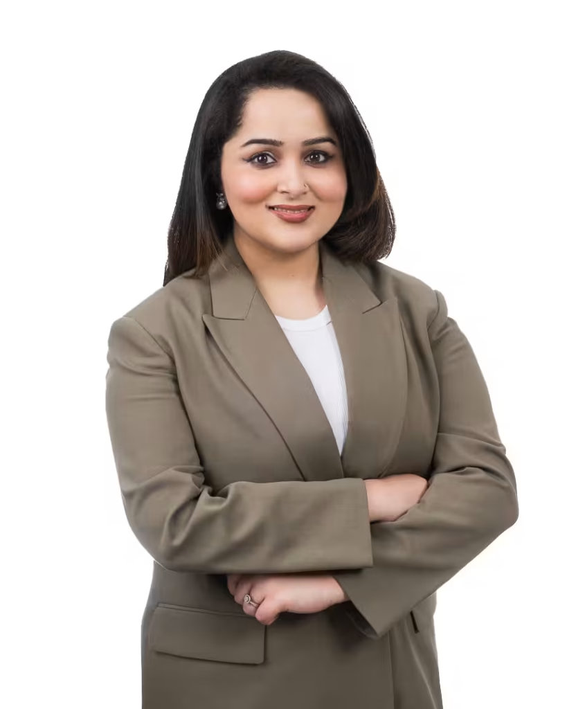 A real estate broker at VanHaus wearing an olive green double-breasted suit for a vancouver professional headshot.