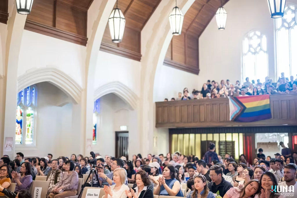 Large audience filling the pews and balcony of Pacific Spirit United Church for a classical music concert