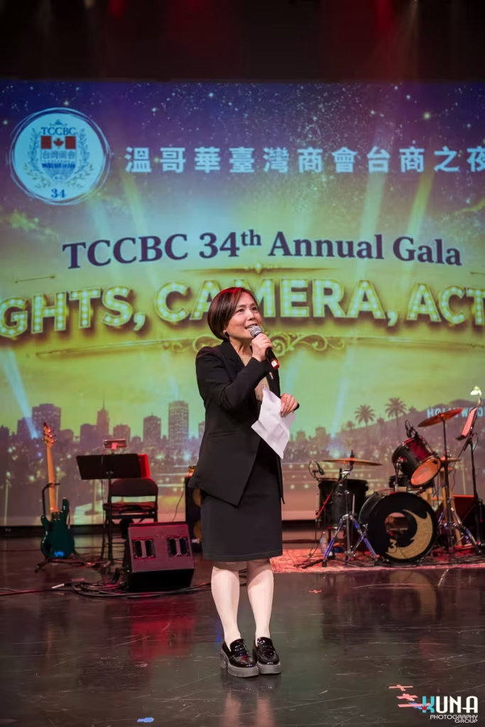 Corporate event speaker photography at River Rock Theatre Richmond A guest, Director General, Taipei Economic and Cultural Office in Vancouver, Angela Liu delivering a formal presentation at the corporate dinner event.
