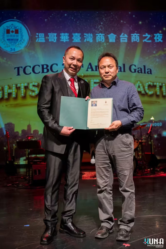 Stage award photography at the 2026 TCCBC Annual Gala President Eddie Chen received a certificate of recognition on stage.