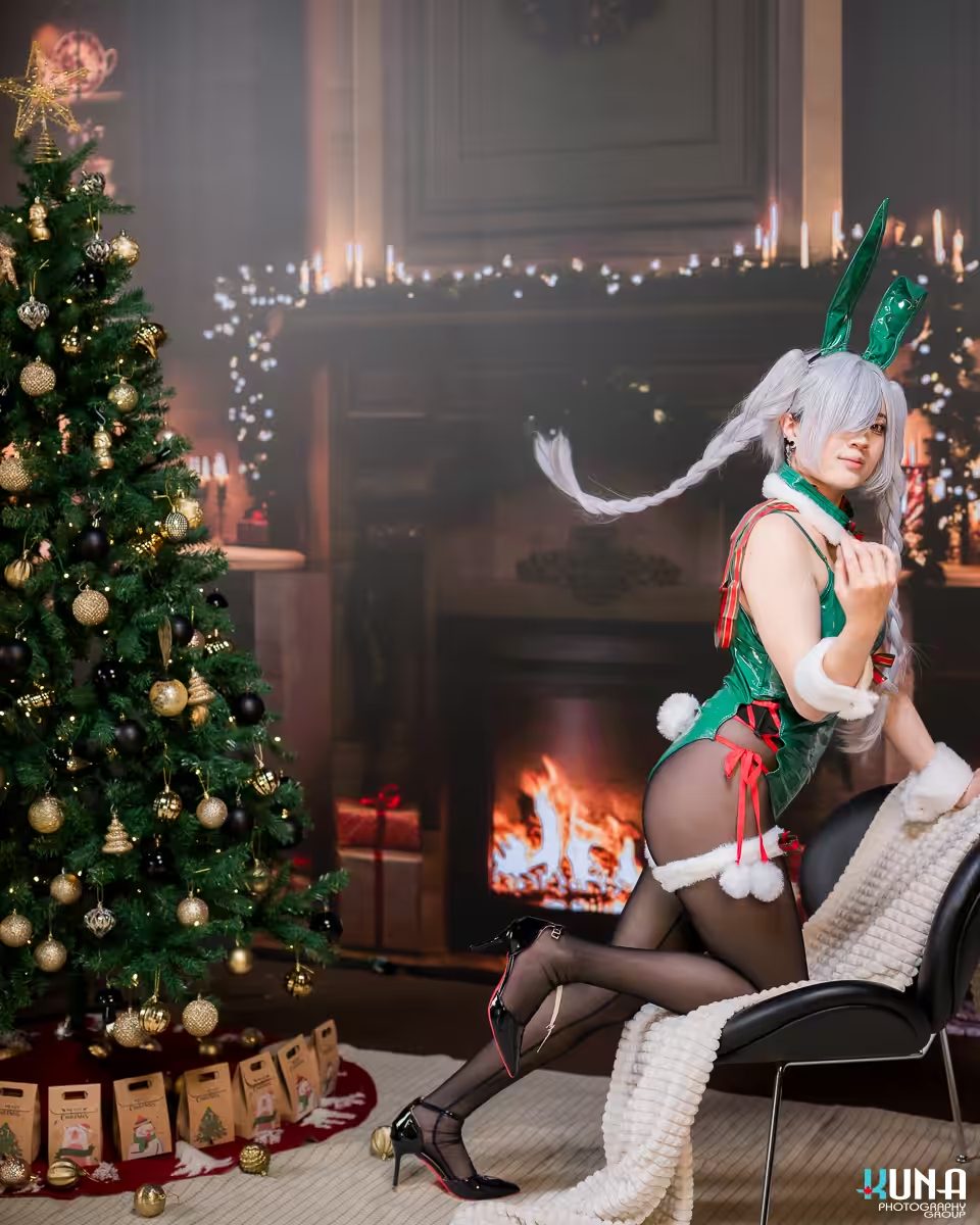 A dynamic turn and pose from a cosplayer showcasing the vivid LED fireplace background in British Columbia.